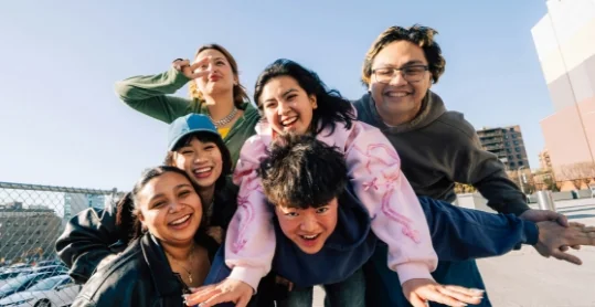 Group of students smiling together outdoors